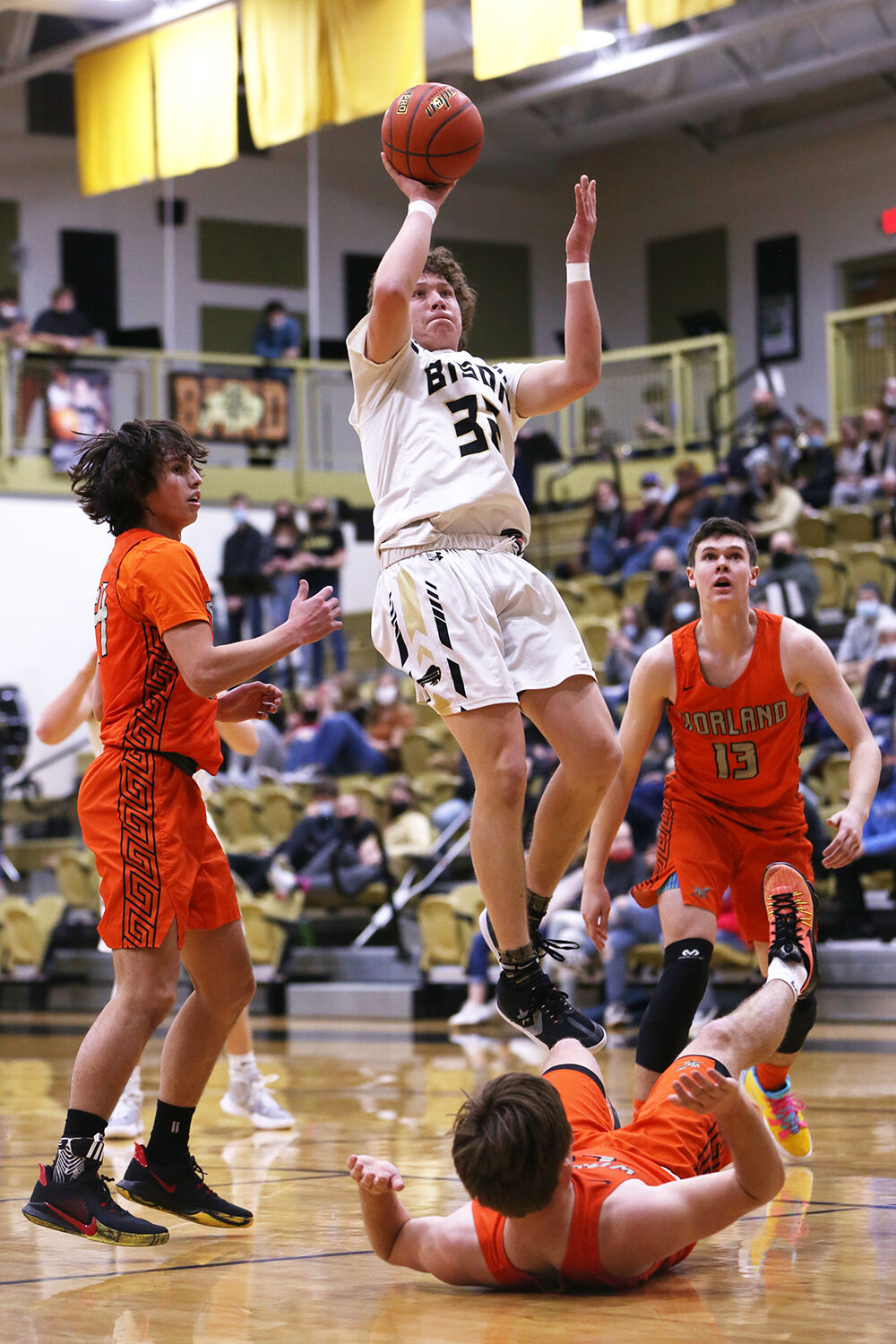 Calvin Rule takes a two point shot as Worland senior Rudy Sanford